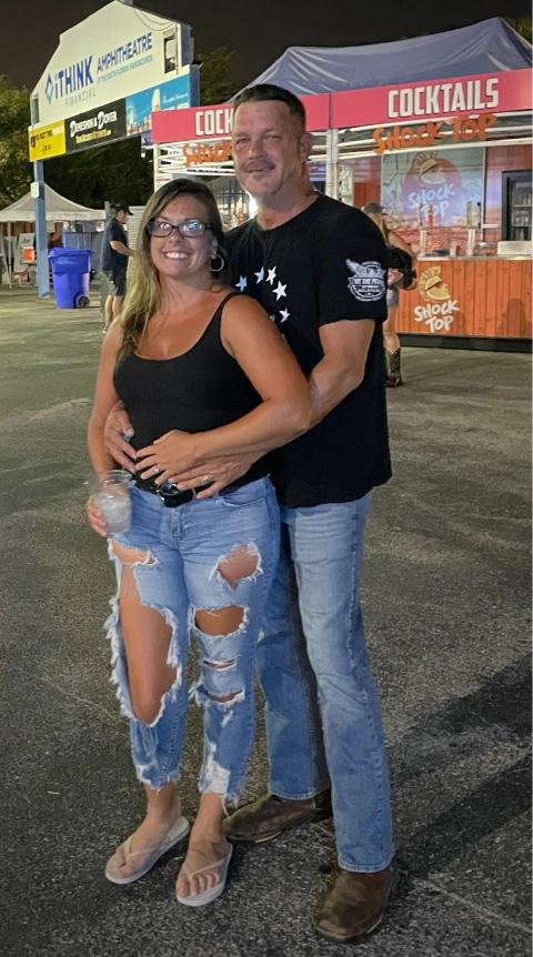 jess and mike posing for a photograph